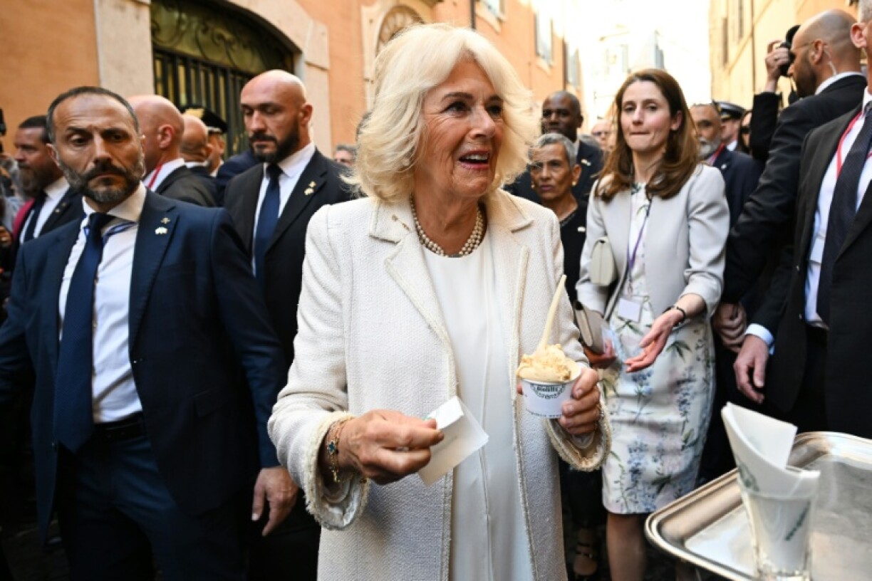 Britain's Queen Camilla stopped for an ice cream outside the Italian Parliament in Rome