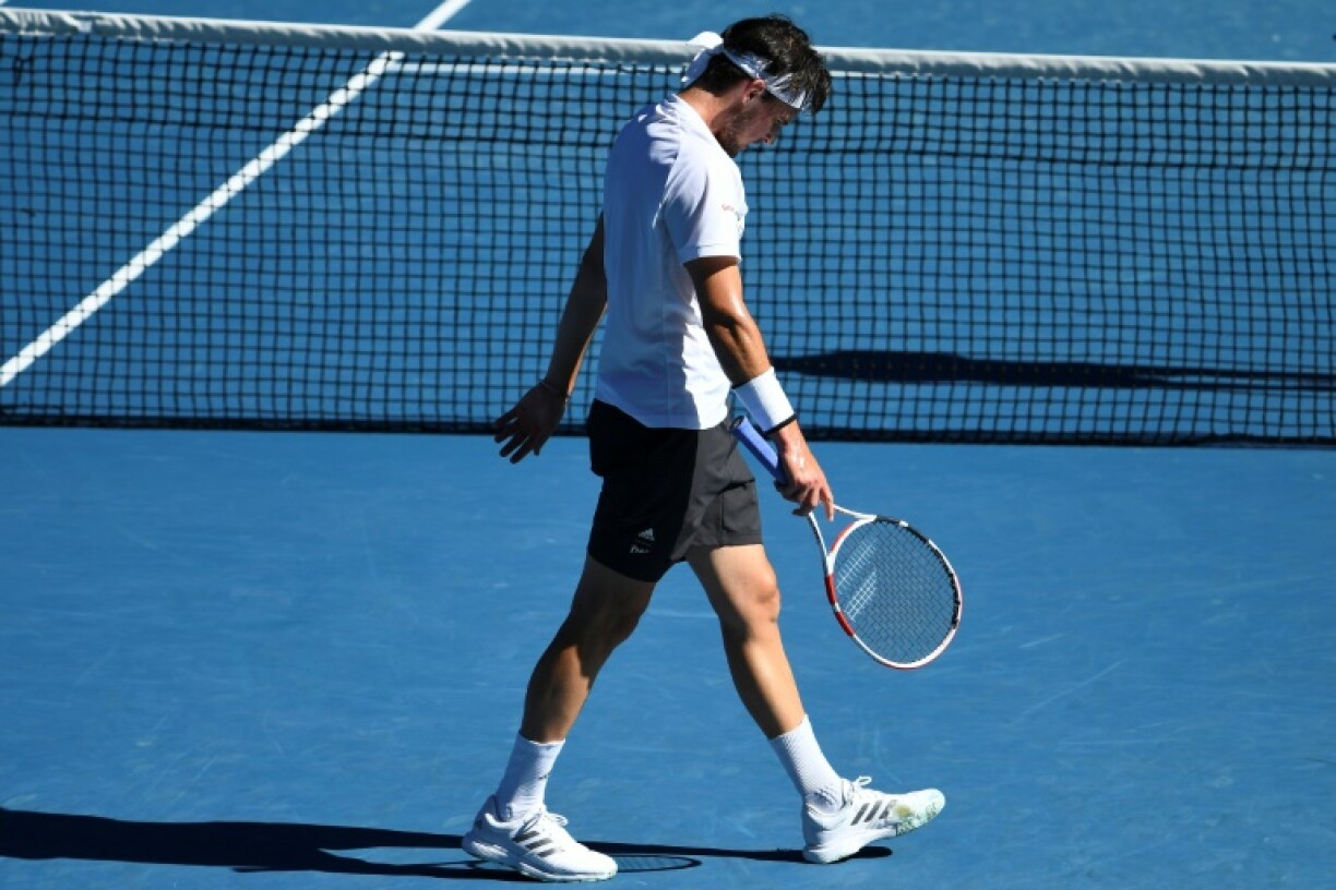 L'Autrichien Dominic Thiem, lors de son match, perdu, face au Bulgare Grigor Dimitrov, en 8e de finale de l'Open d'Australie à Melbourne le 14 février 2021