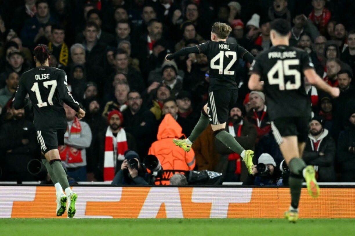 Bayern Munich teenager Lennart Karl (centre) celebrates scoring against Arsenal