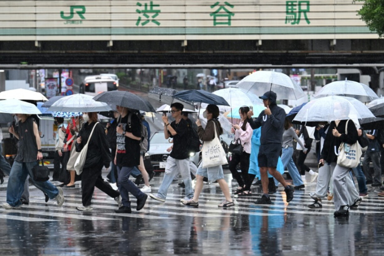 (FILES) Tokyo has logged 34 straight days of rainy days, the longest streak on record, Japan's weather agency said