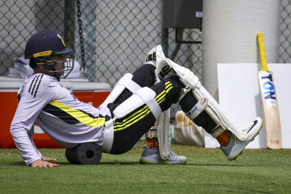 India's Shubman Gill stretches during a training session at The Gabba in Brisbane