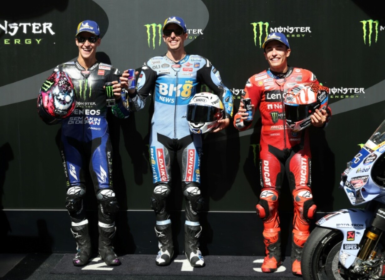 Pole position winner BK8 Gresini Racing MotoGP team's Spanish MotoGP rider Alex Marquez with Fabio Quartararo and his brother Marc Marquez