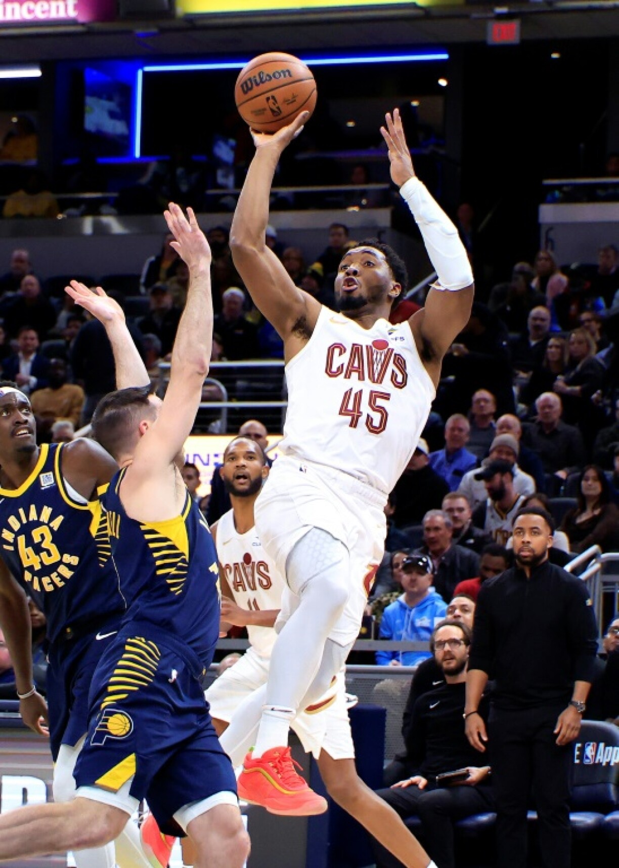Cleveland's Donovan Mitchell takes a shot over T.J. McConnell in the Cavaliers' NBA victory over the Indiana Pacers