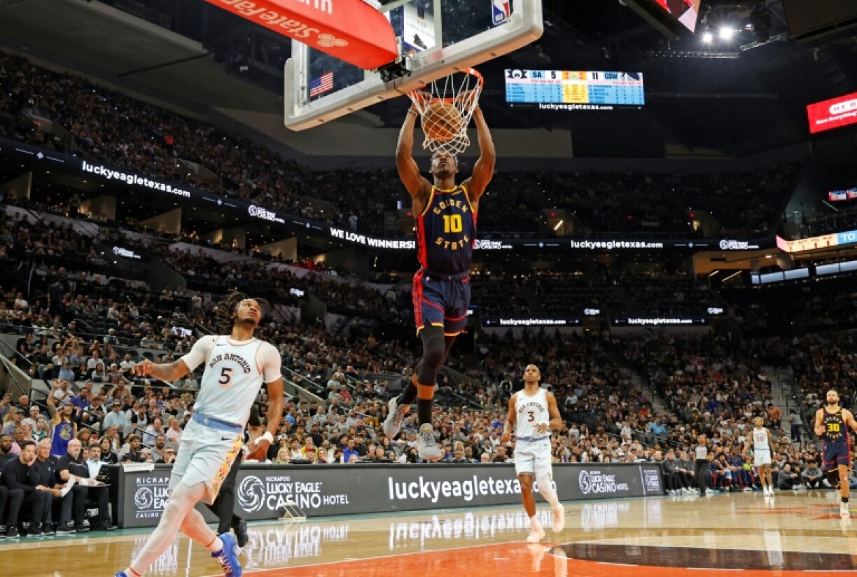 Jimmy Butler of the Golden State Warriors dunks in the Warriors' NBA victory over the San Antonio Spurs