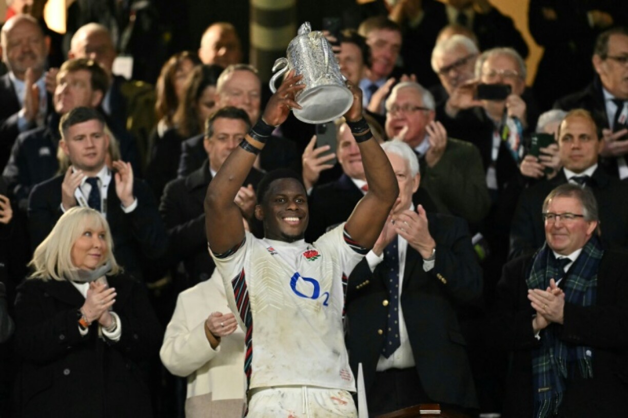 Trophy regained: England captain Maro Itoje lifts the Calcutta Cup after a 16-15 Six Nations win over Scotland at Twickenham