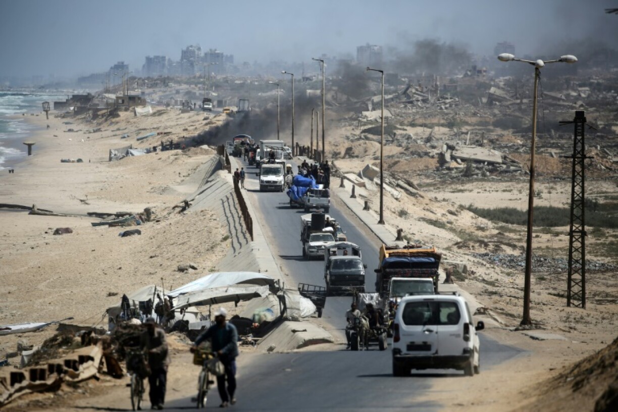 Long lines of Palestinians fled southward as Israel pressed operations around Gaza City