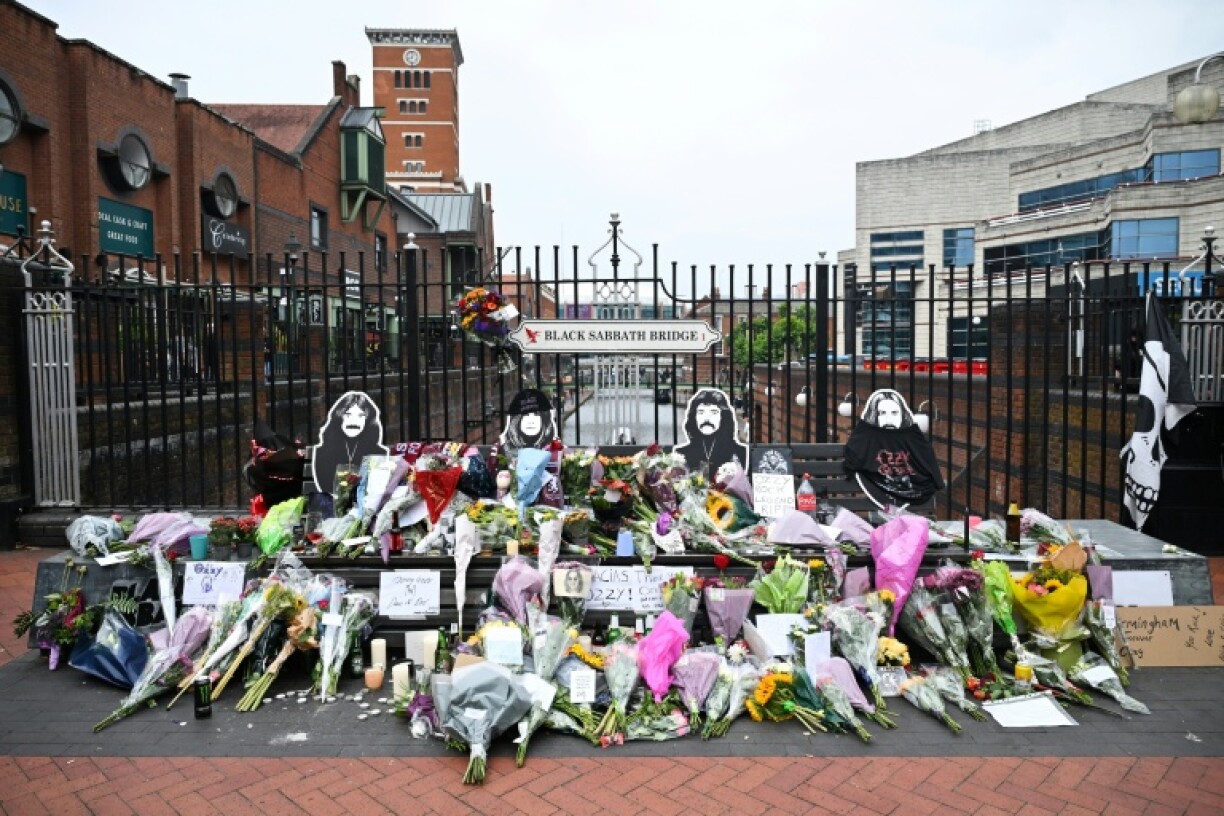 The hearse travelled over Black Sabbath bridge where thousands of fans have left tributes since the heavy metal legend died on July 22