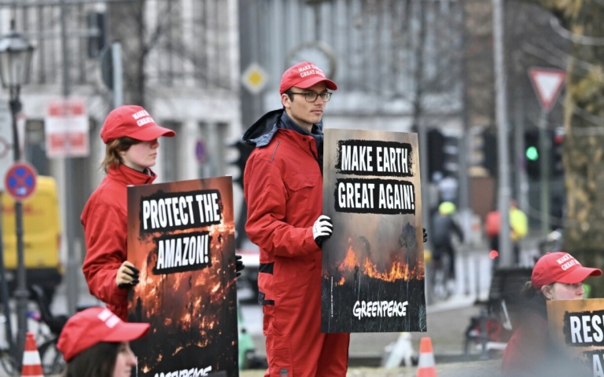Greenpeace activists protested outside the Petersberg Climate Dialogue in Berlin
