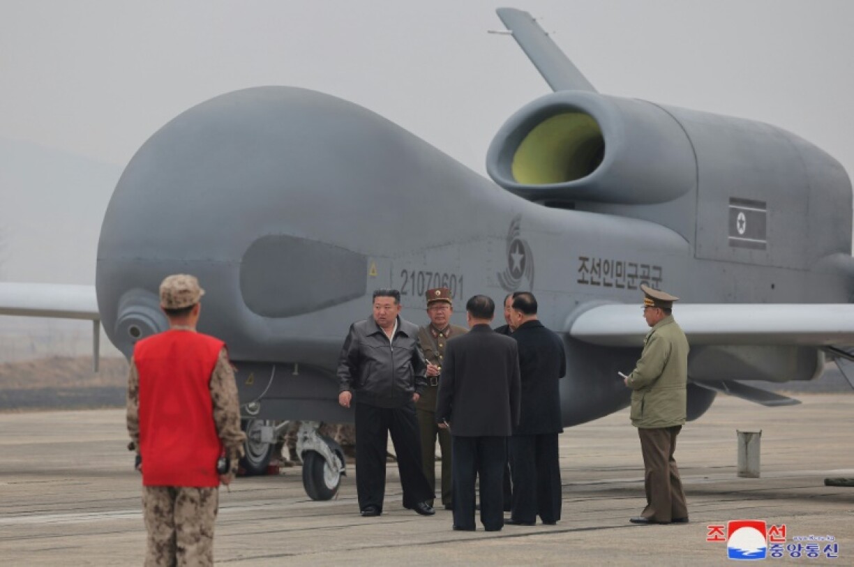 North Korean leader Kim Jong Un oversaw the test of new suicide and reconnaissance drones, state media reported