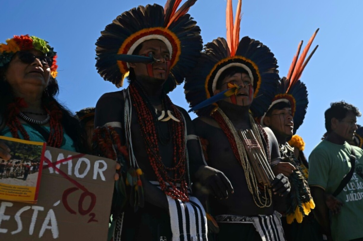 Indigenous people take part in a demonstration during the auction of oil blocks near the mouth of the Amazon river