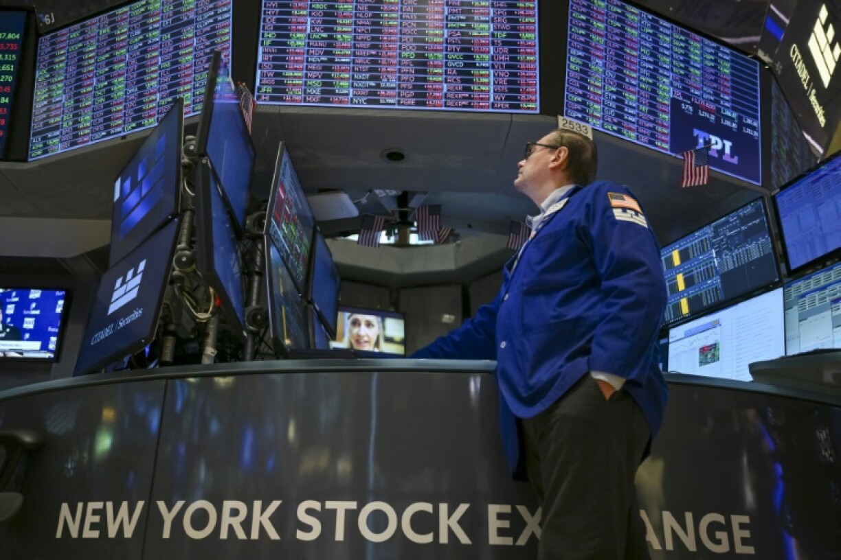 A trader works on the floor of the New York Stock Exchange (NYSE) at the opening bell earlier this month