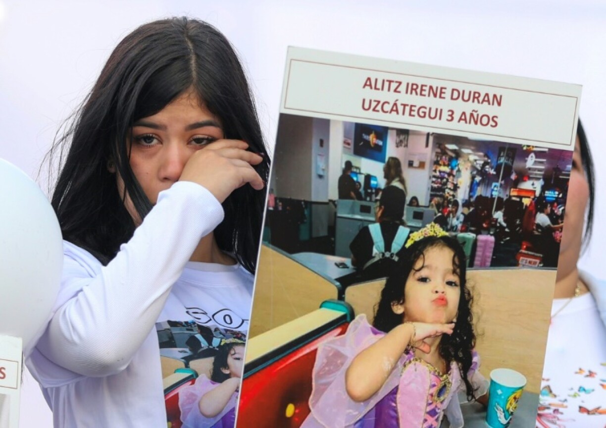 A woman cries during a demonstration in Caracas for children who remain in the US after being separated from their parents during deportation