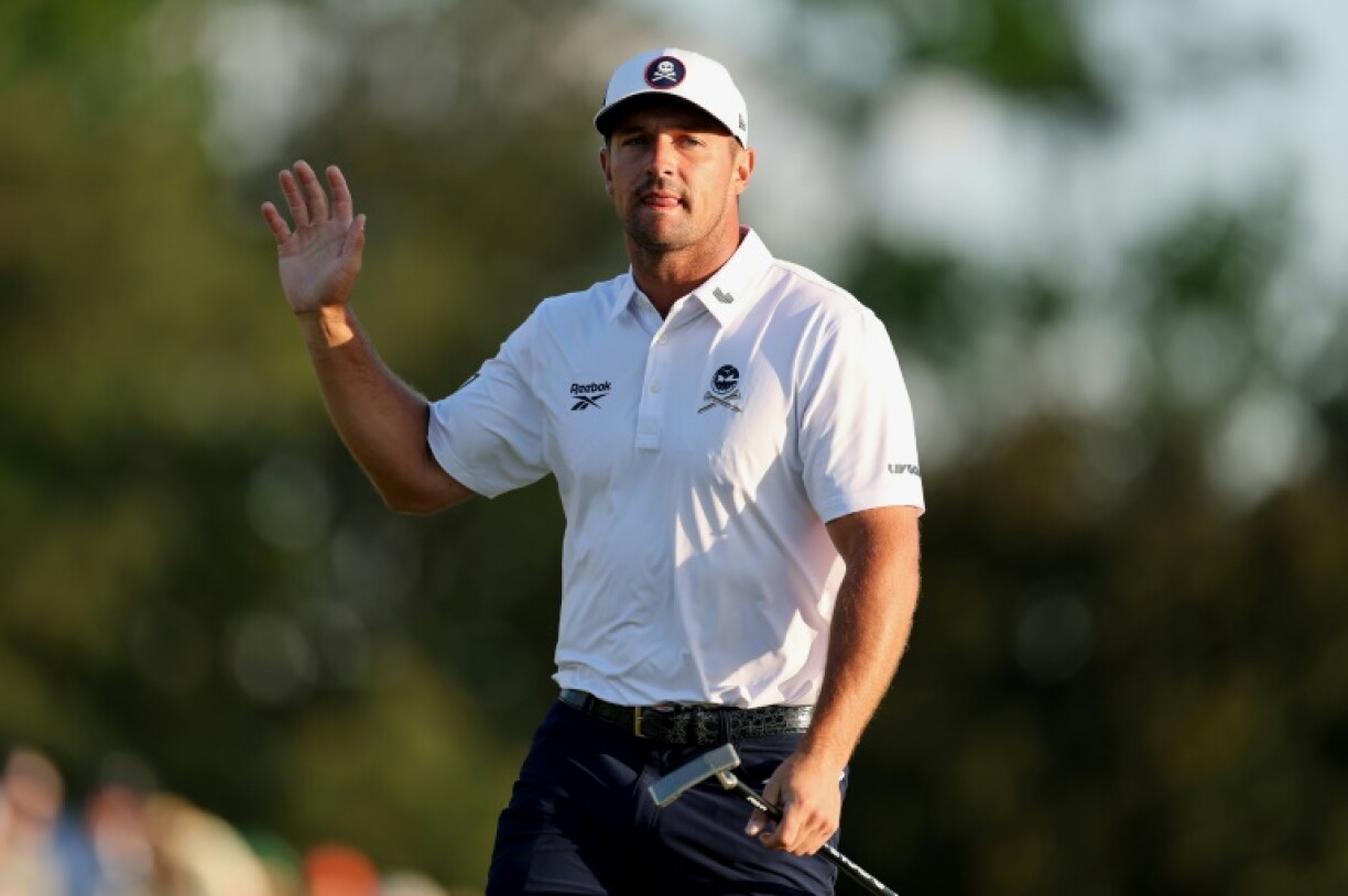 American Bryson DeChambeau acknowledges the crowd on the 18th green in the third round of the Masters at Augusta National