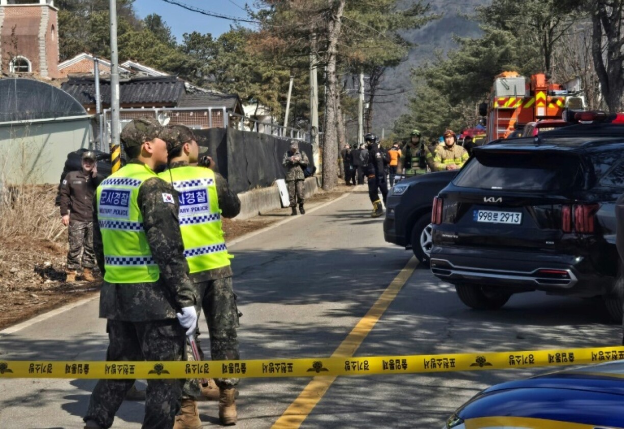 South Korean soldiers stand near a bomb accident site outside a military live-fire training range in Pocheon