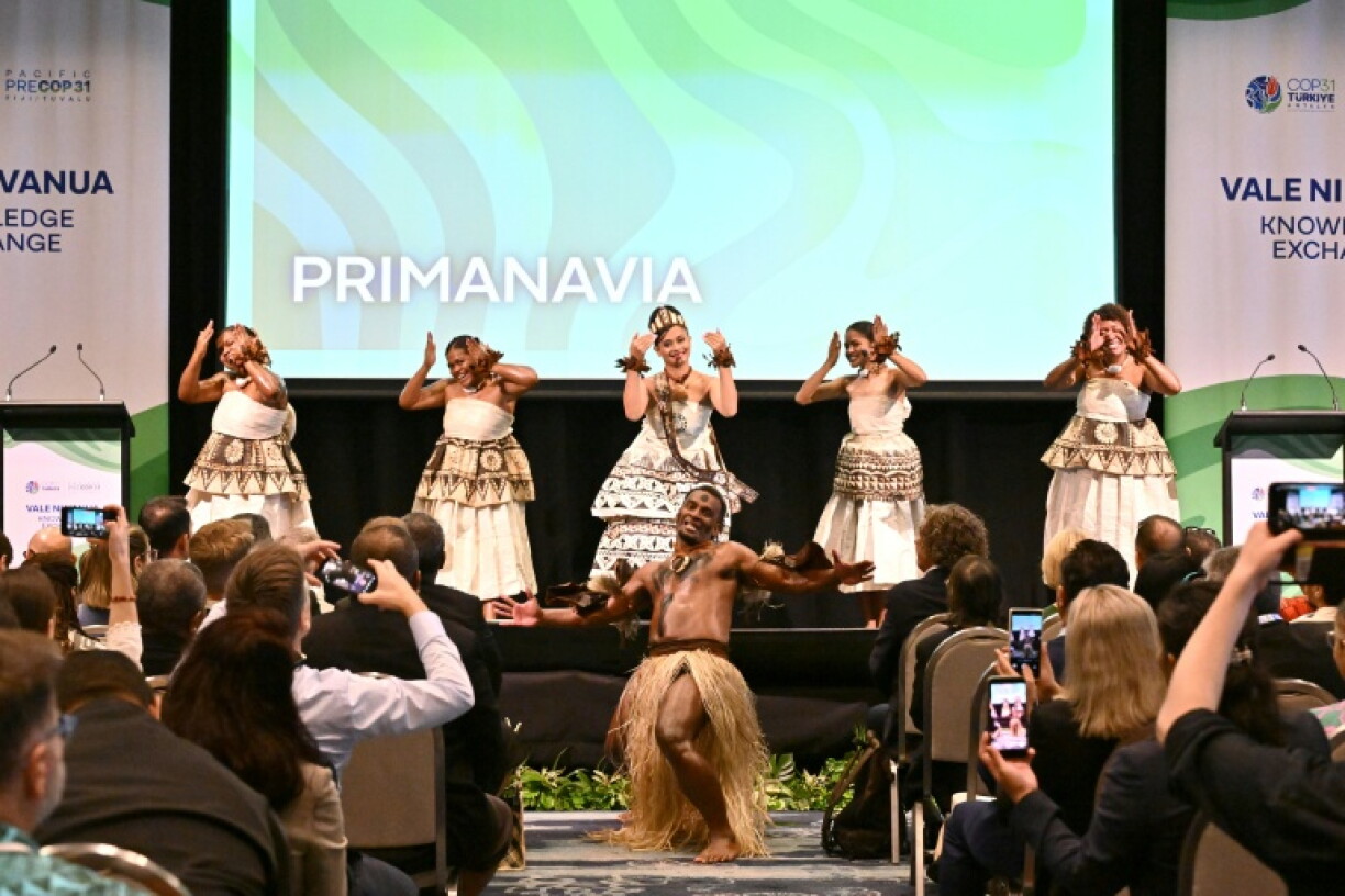 Traditional dancers perform at an opening ceremony of the Pacific Pre-COP31 Summit in Nadi on October 5, 2026.
