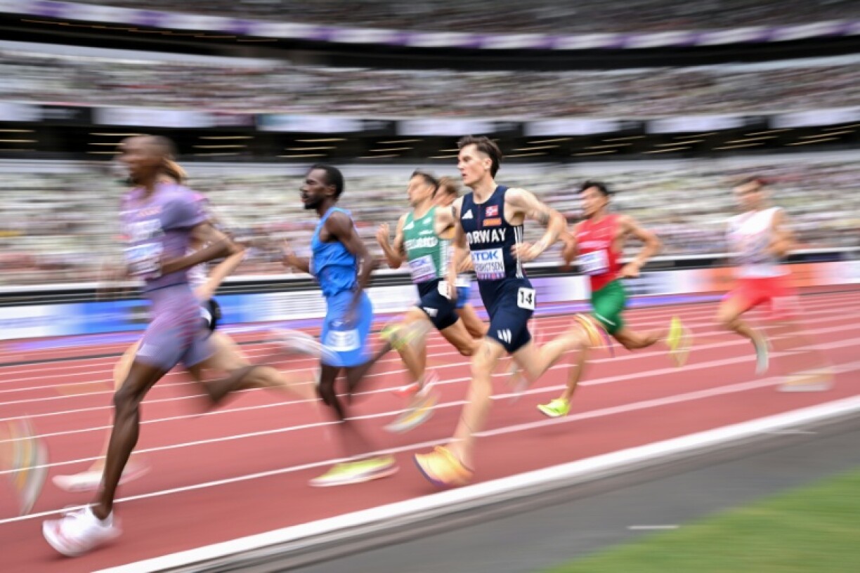 Norway's Jakob Ingebrigtsen (C) competes in the men's 1500m at hte world championships in Tokyo