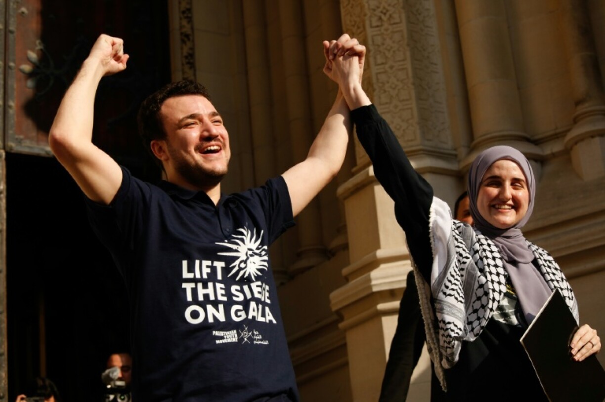 Former Columbia University graduate student Mahmoud Khalil (L) spent 104 days in federal detention after being targeted by the Trump administration for deportation