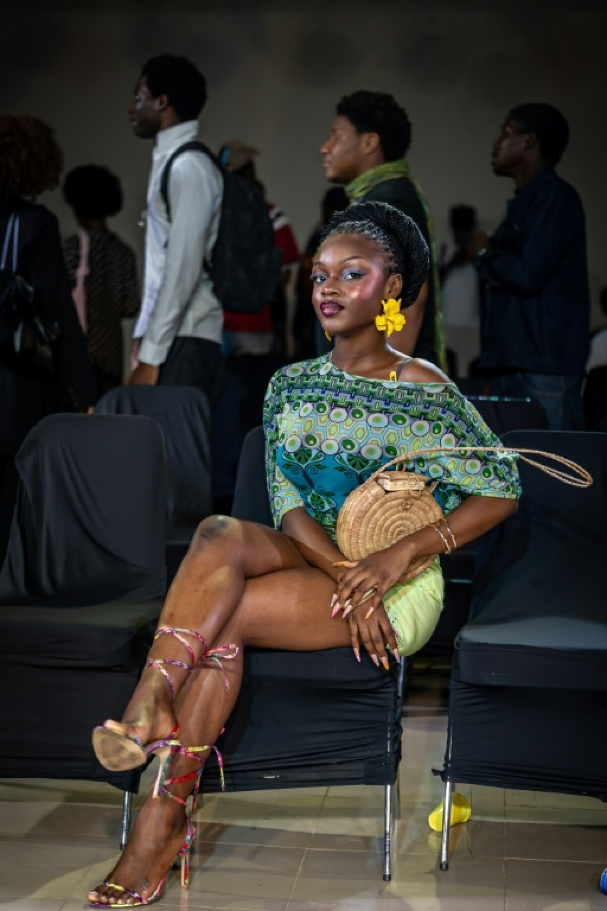 Guests and attendees bring their own style to Nigeria Fashion Week, which also hosts vendors selling handbags, menswear and leather goods for the general public