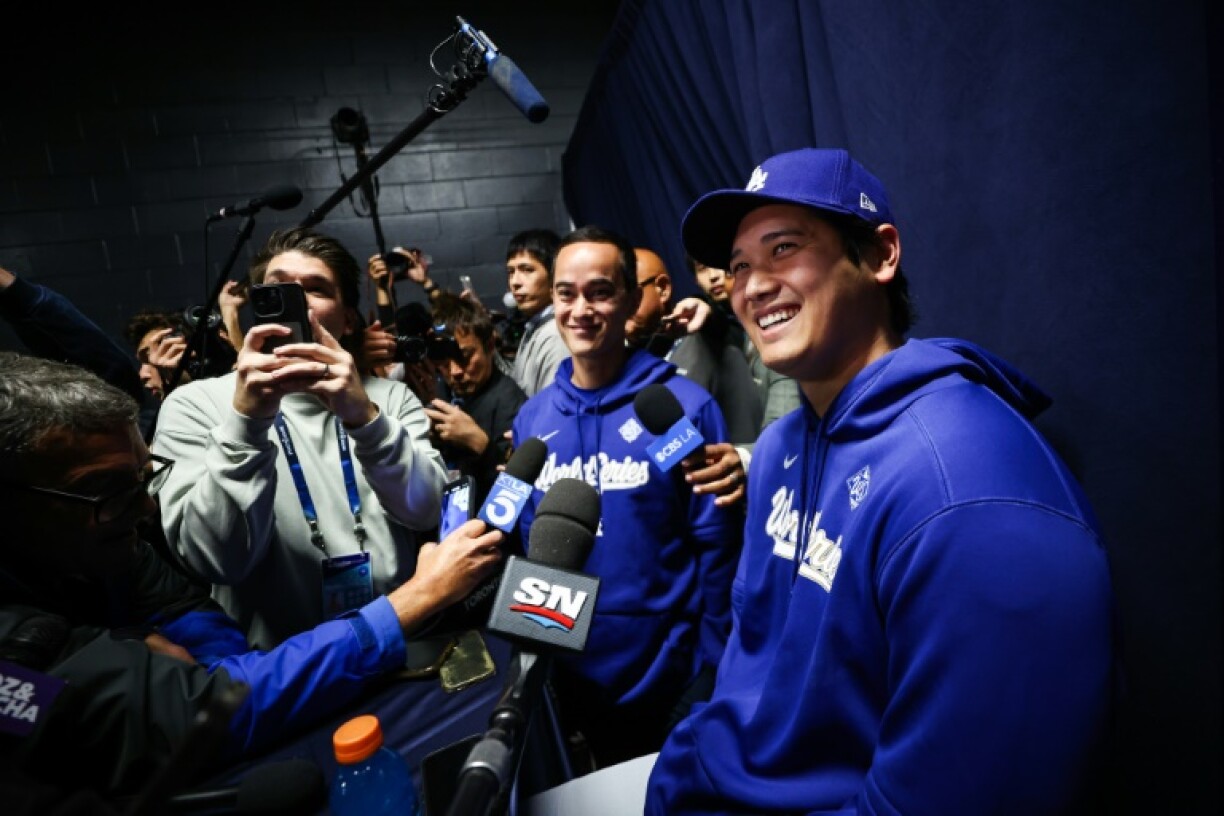 Shohei Ohtani addresses the media ahead of the Los Angeles Dodgers' MLB World Series game one opener against the Toronto Blue Jays