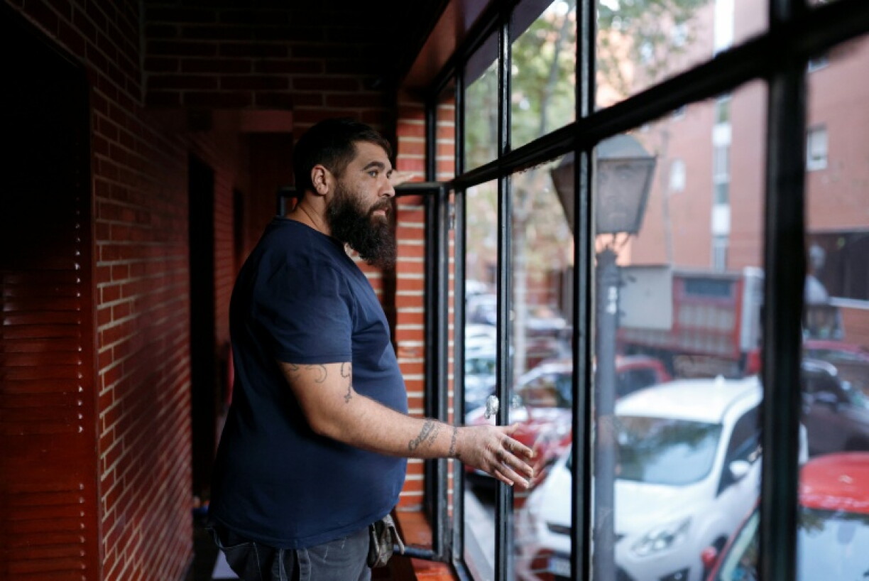 Manuel Navarro, 32, lives with his wife and three young children in a flat that they occupy without authorisation