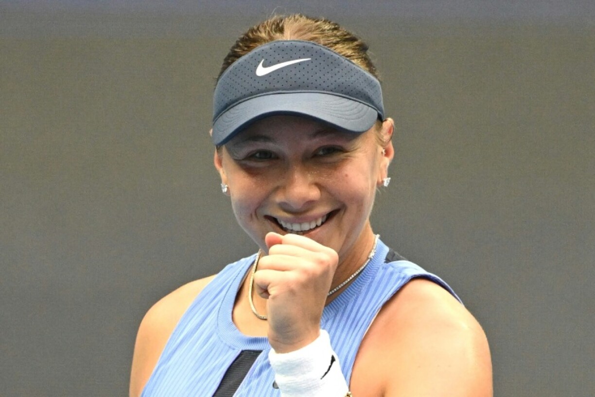 Amanda Anisimova celebrates after beating Coco Gauff