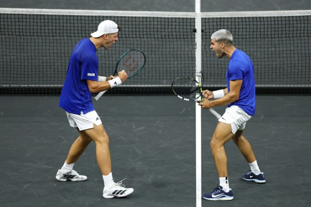 Jakub Mensik and Carlos Alcaraz of Team Europe react on the way to a Laver Cup doubles victory over Tam World's Taylor Fritz and Alex Michelsen