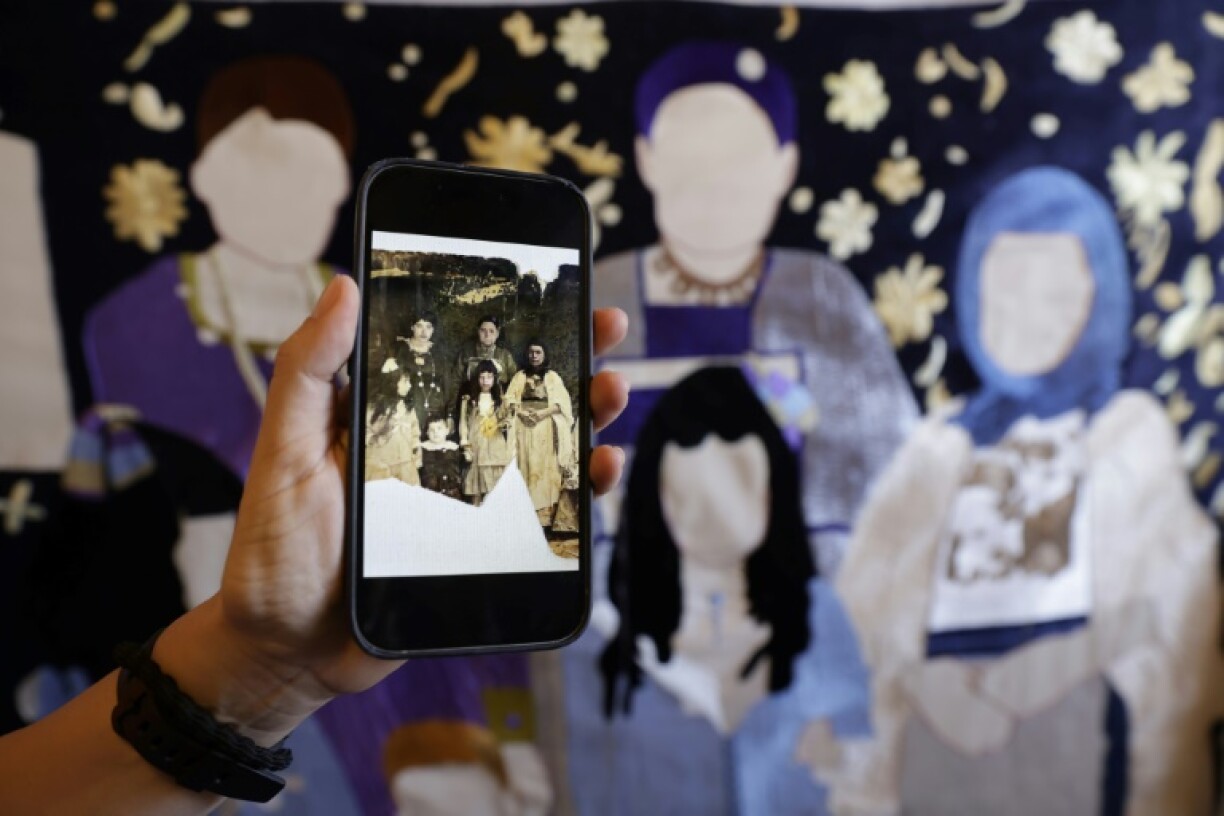 An old photograph being used as the basis for one artwork