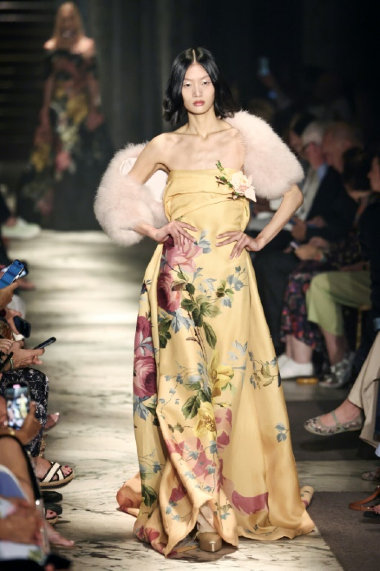 Chinese model Yilan Hua presents a rose-embellished creation for Elie Saab