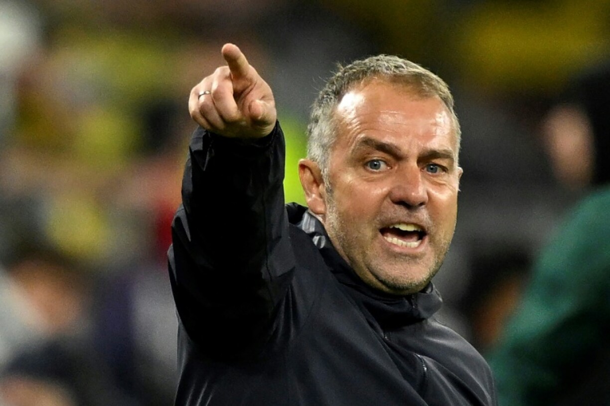 Barcelona coach Hansi Flick reacts during the Champions League quarter-final second leg against Borussia Dortmund on April 15, 2025