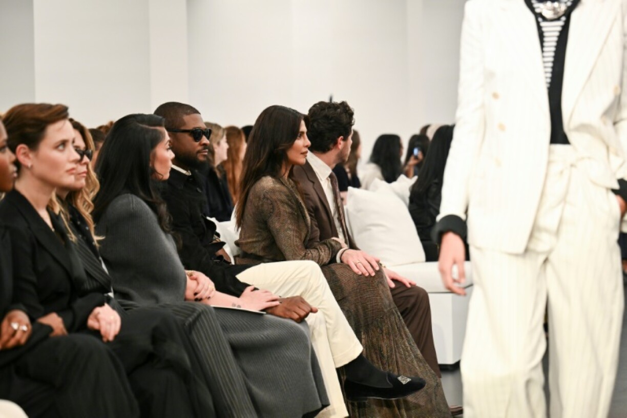 Usher (C), Priyanka Chopra (2nd R) and Nick Jonas (R) attend the Ralph Lauren Spring 2026 show