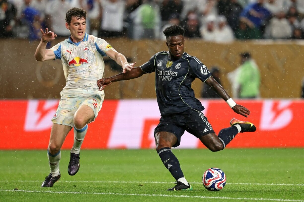 Vinicius Junior (R) scores Real Madrid's opening goal in their 3-0 win over Salzburg in Philadelphia