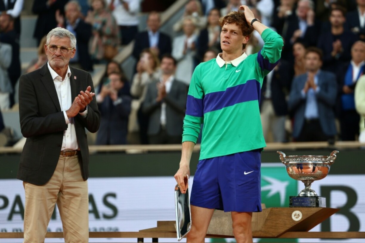 Jannik Sinner (R) held three championship points but failed to convert them as Carlos Alcaraz fought back to win the French Open final in five sets
