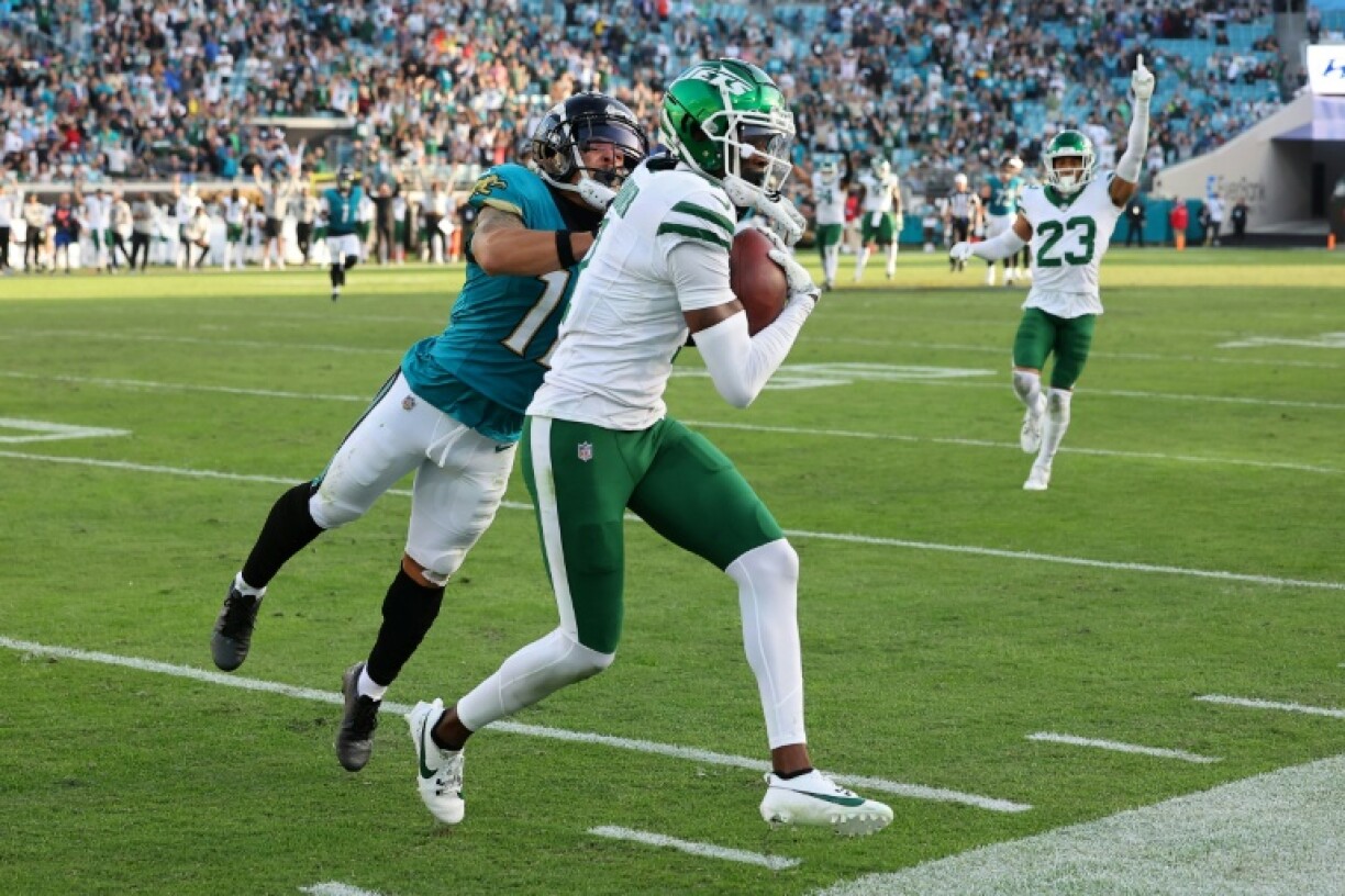 Sauce Gardner, intercepting a pass for the New York Jets against Jacksonville, will play for Indianapolis against Atlanta in Berlin after being traded to the Colts and completing NFL concussion protocols