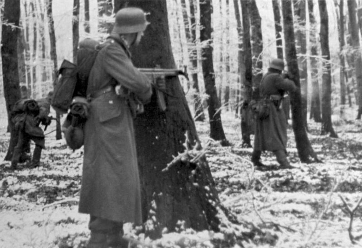A German regiment of grenadiers encircled in Luxembourgish woods on 22 December 1944.