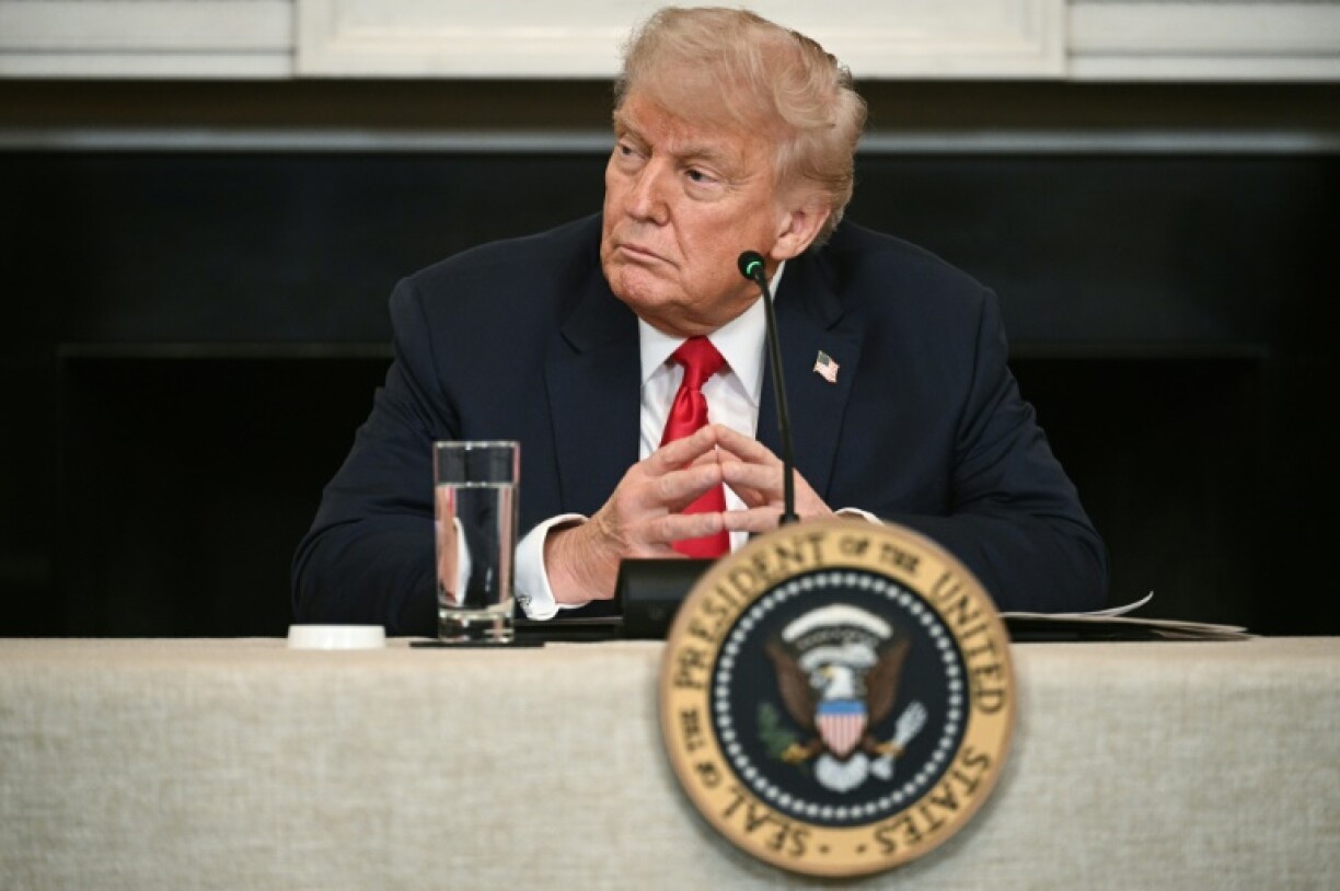 US President Donald Trump participates in an