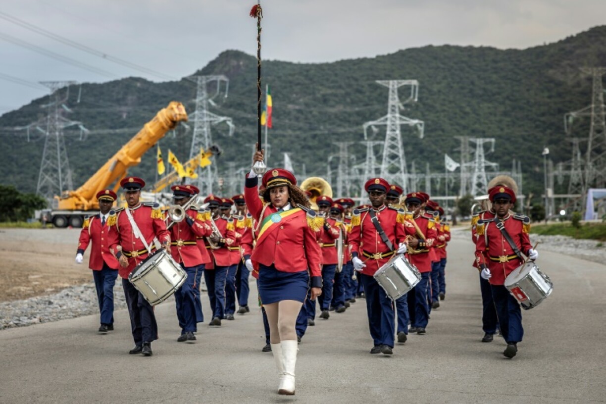 A band performed ahead of the dam's inauguration in Guba