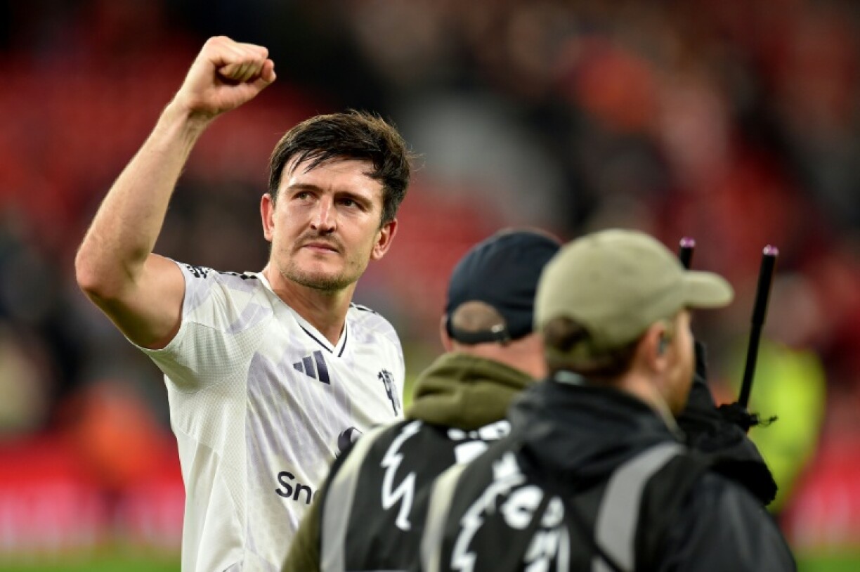 Goalscorer Harry Maguire celebrates Manchester United's 2-1 win against Liverpool at Anfield
