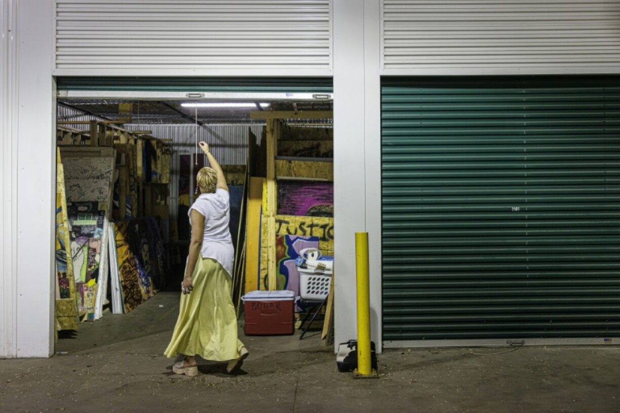 The preserved boards range from simple graffiti to colorful murals