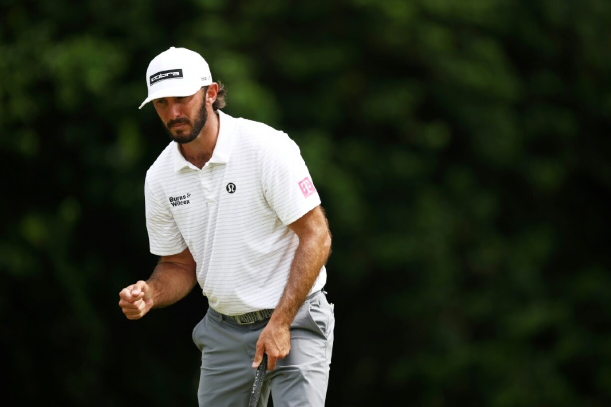 American Max Homa pumps his fist after making a birdie putt on the third hole in shooting a seven-under 64 in the second round of the PGA Championship at Quail Hollow
