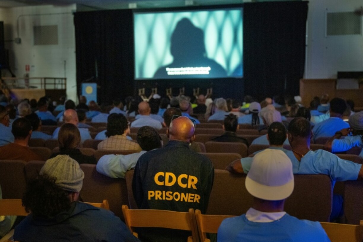 Inmates and guests watch a screening during the San Quentin Film Festival at the infamous California prison
