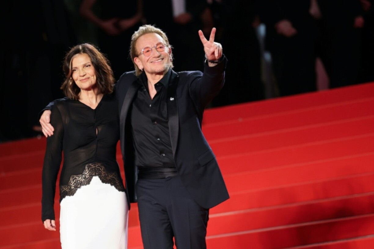 U2 frontman Bono with his wife Irish activist Ali Hewson at the Cannes premiere of his new film