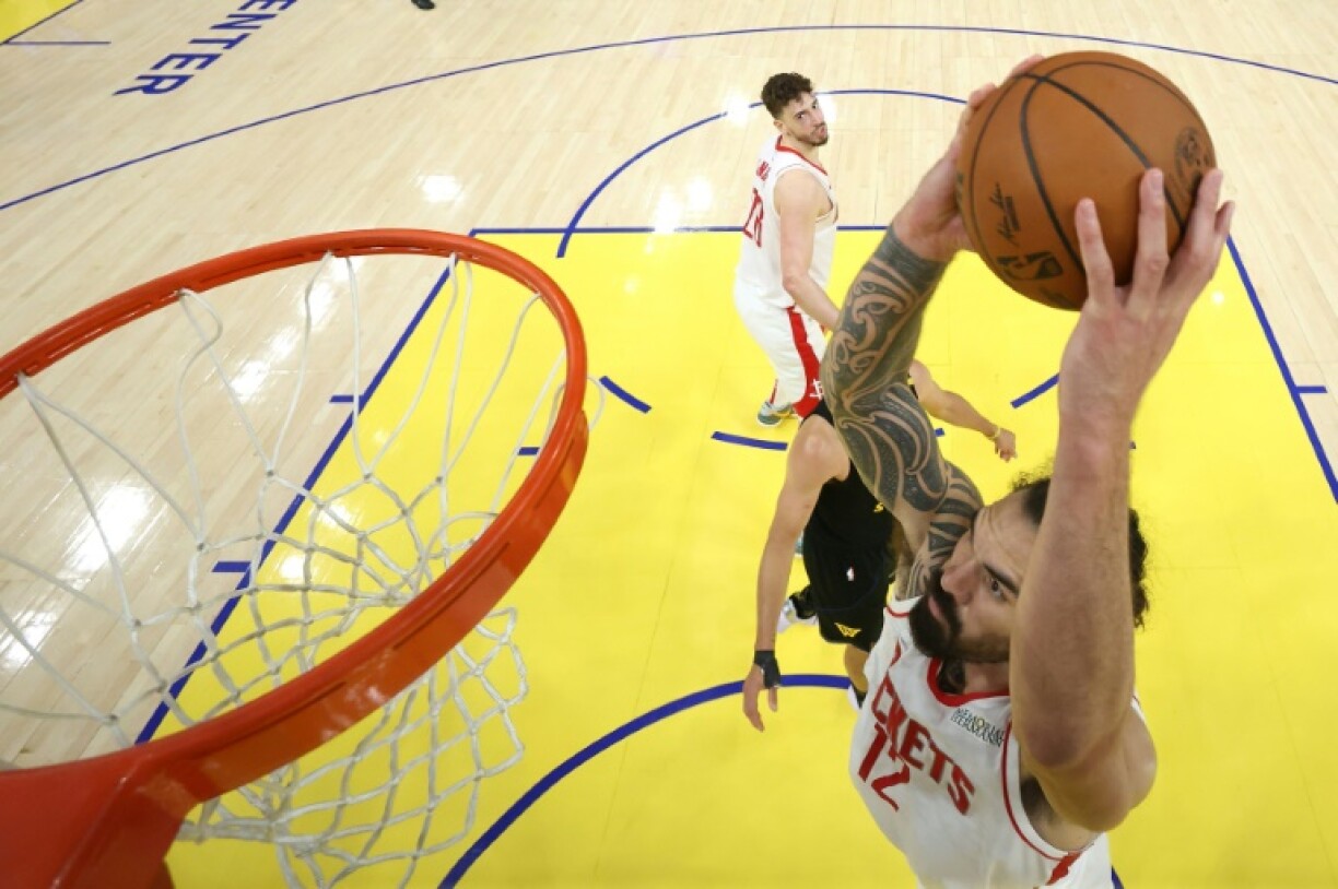 Steven Adams of the Houston Rockets throws down a dunk in the Rockets' victory over the Golden State Warriors in game six of their NBA playoff series