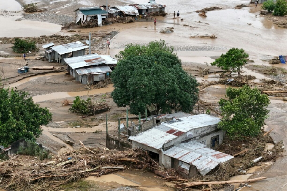 Flood-hit houses in Tuao town, Cagayan province, are seen from above after flooding driven by Typhoon Fung-wong