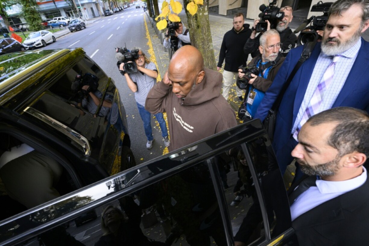 Portland Trail Blazers head coach Chauncey Billups exits federal court in Oregon after his arraignment on charges in relation to his alleged participation rigged illegal poker games