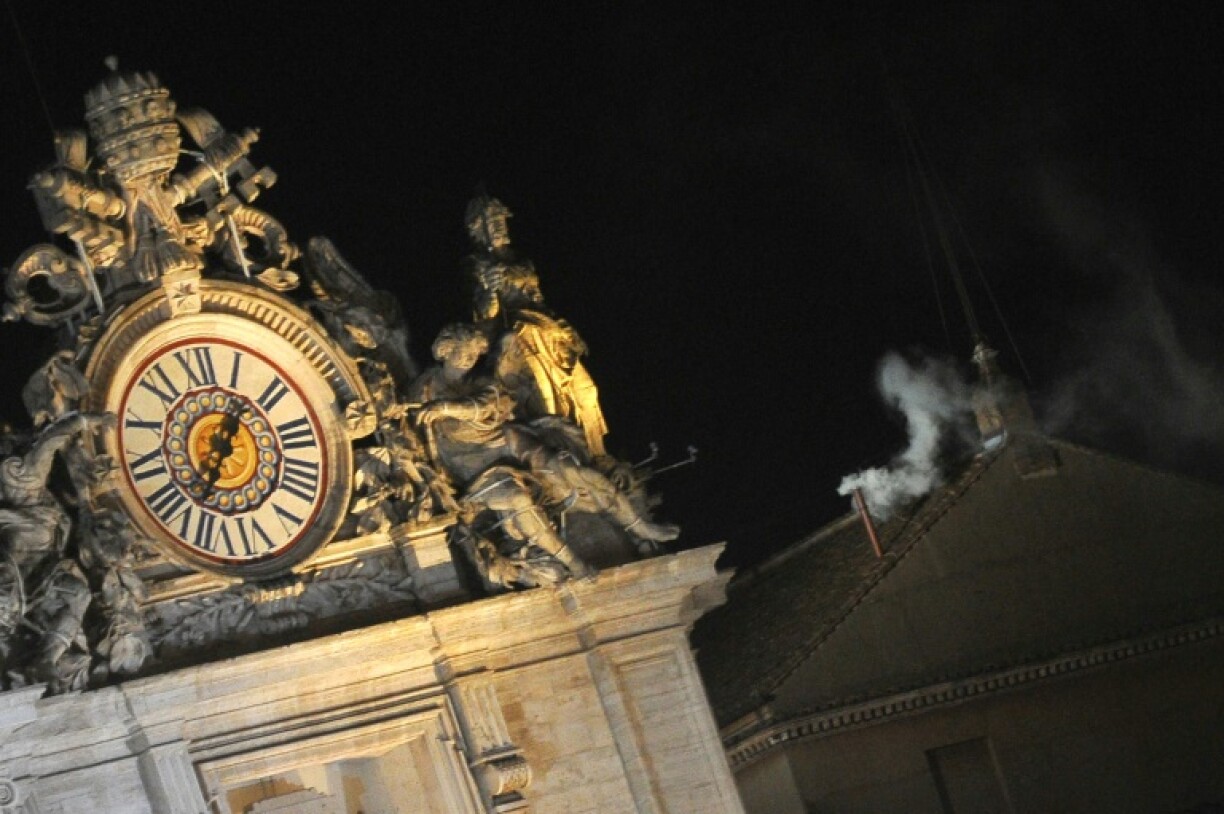 White smoke rises from the Sistine Chapel in 2013 to announce the election of Pope Francis