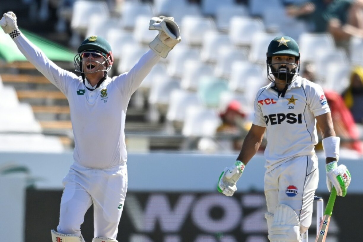 Mohammad Rizwan (R) was one of three wickets to fall to Keshav Maharaj in Pakistan's second innings