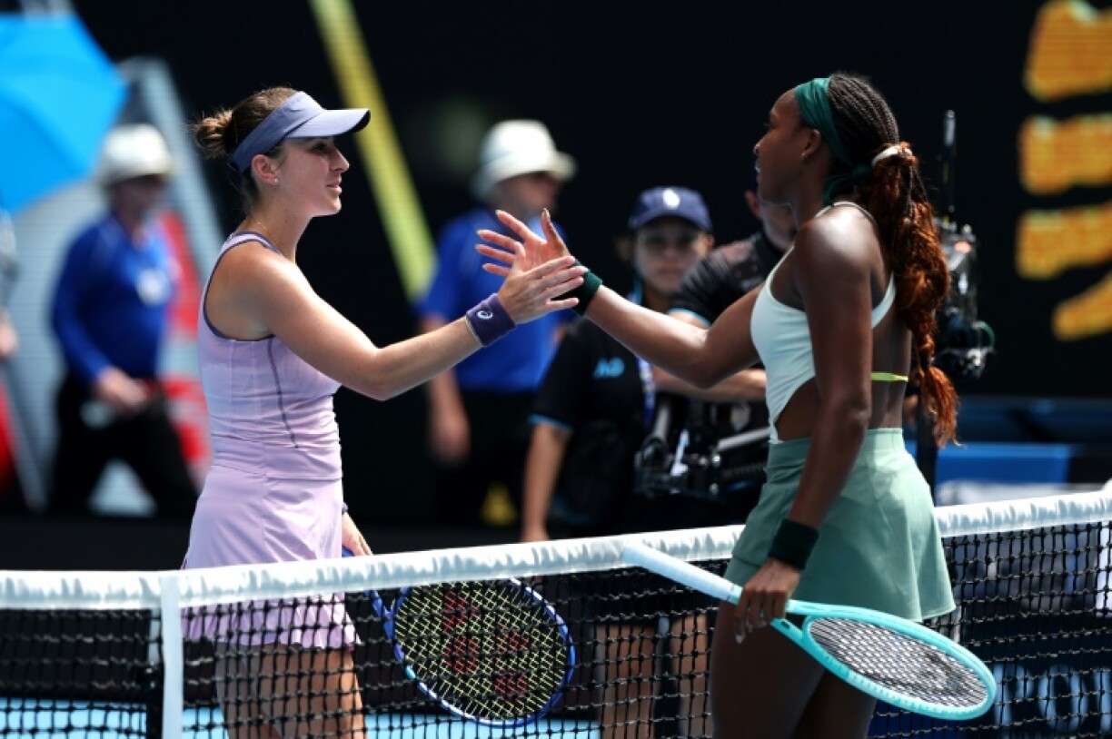 Coco Gauff shakes hands with Belinda Bencic after their women's singles last-16 clash