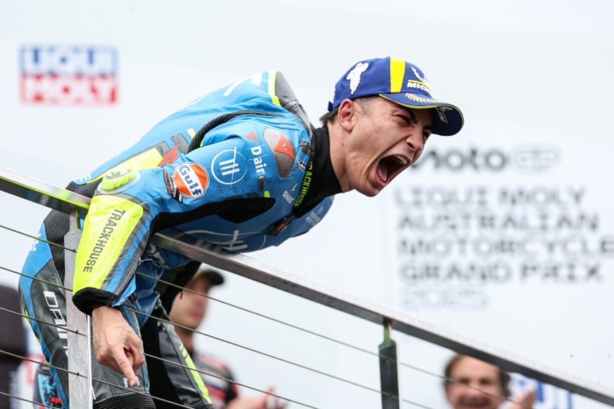 Raul Fernandez celebrates on the podium after winning the Australian MotoGP at Philip Island