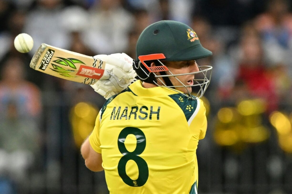 Australia captain Mitchell Marsh plays a shot during the first one-day international cricket match between Australia and India in Perth