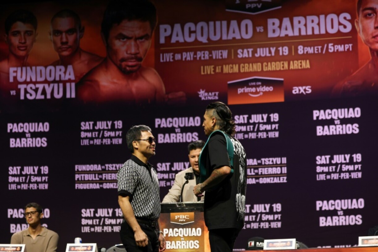 Filipino boxing legend Manny Pacquiao (left) faces off against WBC welterweight champion Mario Barrios ahead of his comeback next month